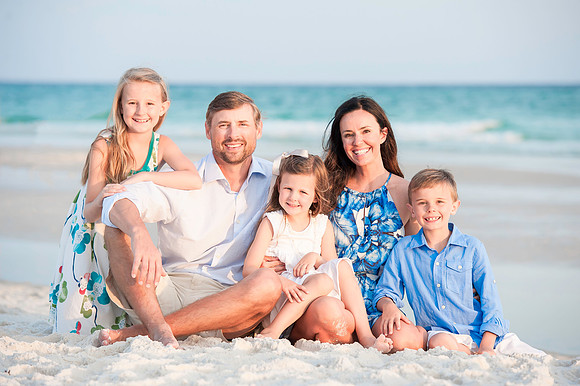 beach photo of family on the beach